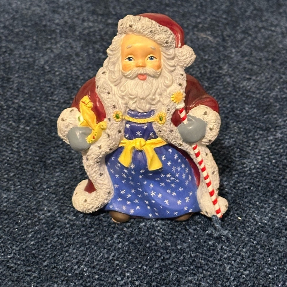 Small Santa with stars on his robe by Lenox’s Collectors Treasury of Santa’s.